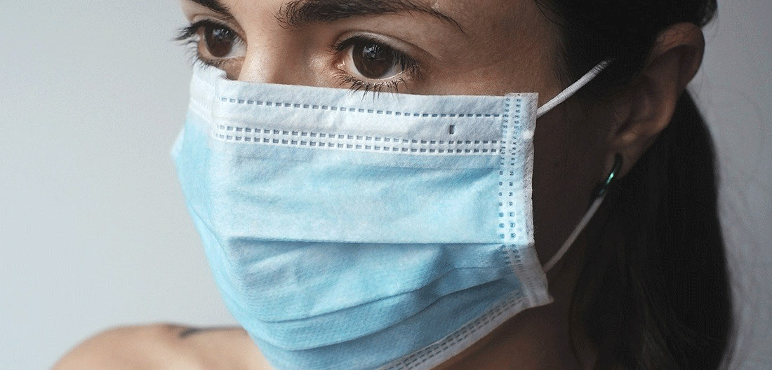 Woman wearing a protective face mask